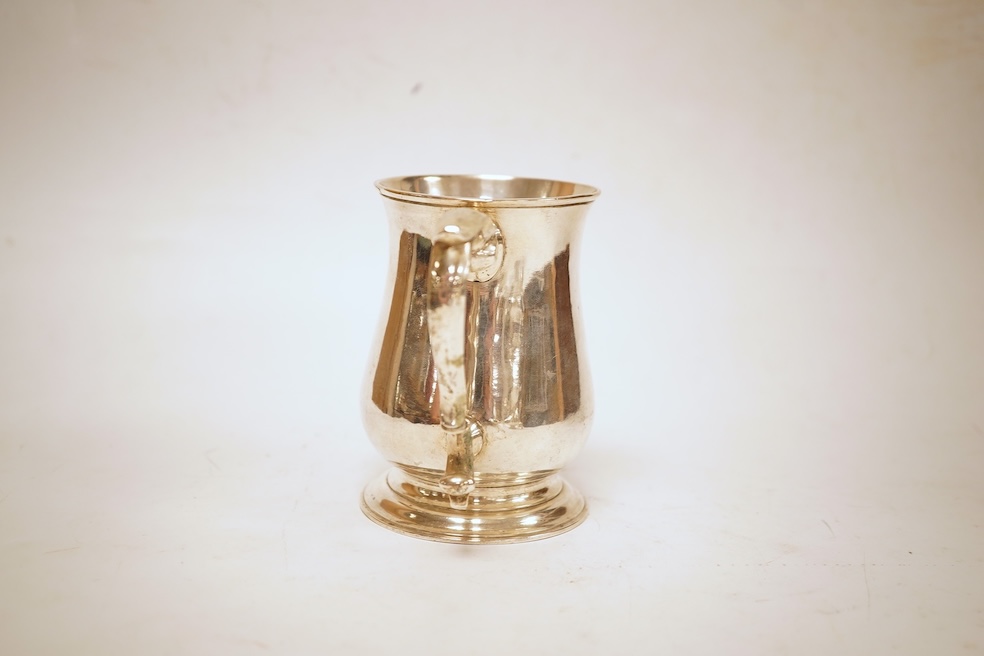 A George III silver baluster mug, by John Payne, London, 1771, height 10.2cm, 7oz.